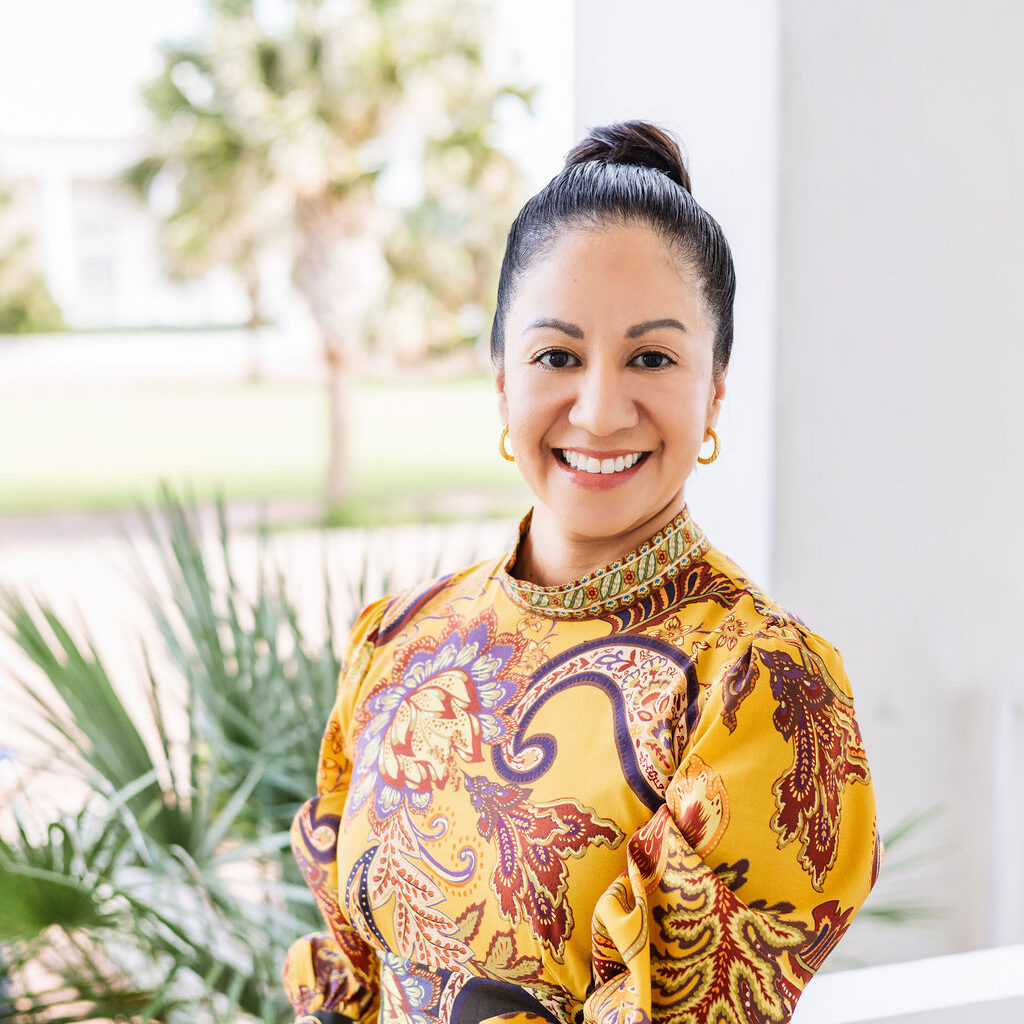 Johanna Torres, Licensed Professional Counselor-Supervisor at Saname Counseling, smiling warmly in a calm, natural setting.
