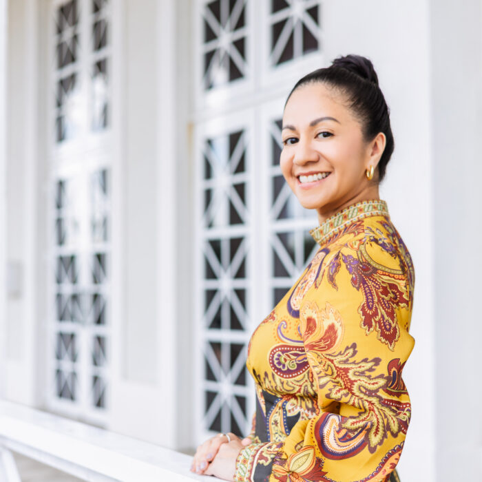 Johanna Torres, Licensed Professional Counselor-Supervisor at Saname Counseling, smiling warmly in a calm, natural setting.